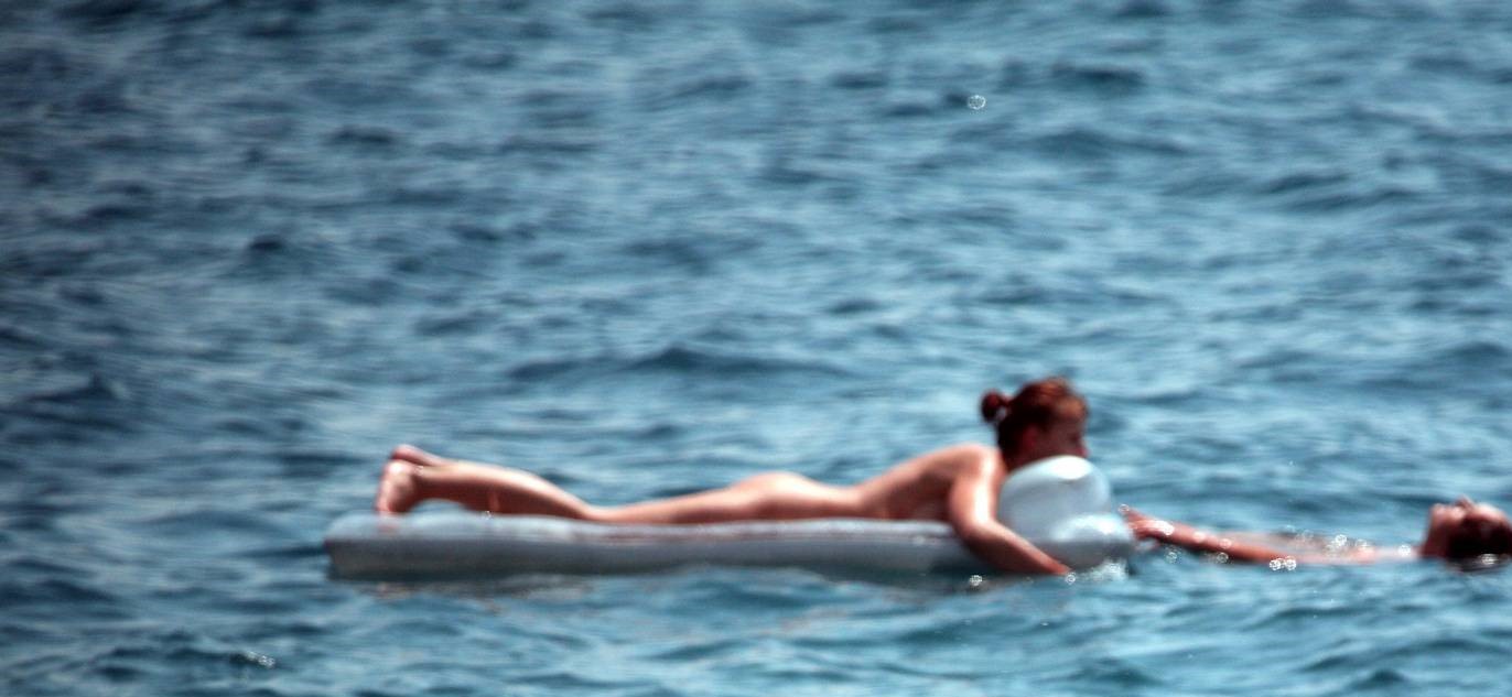 Boys Enjoying Nudist Water Surfing - Celebrating Self-Confidence and Freedom in Nature - 1